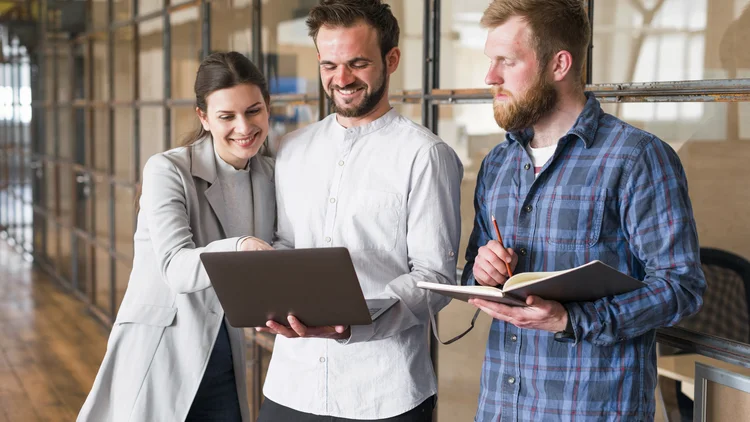 happy-businesspeople-working-together-project-office